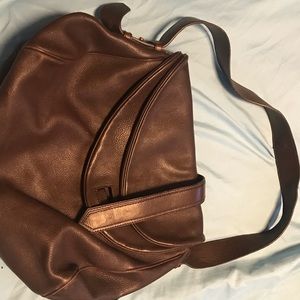 Over the shoulder Bruno Magli purse.